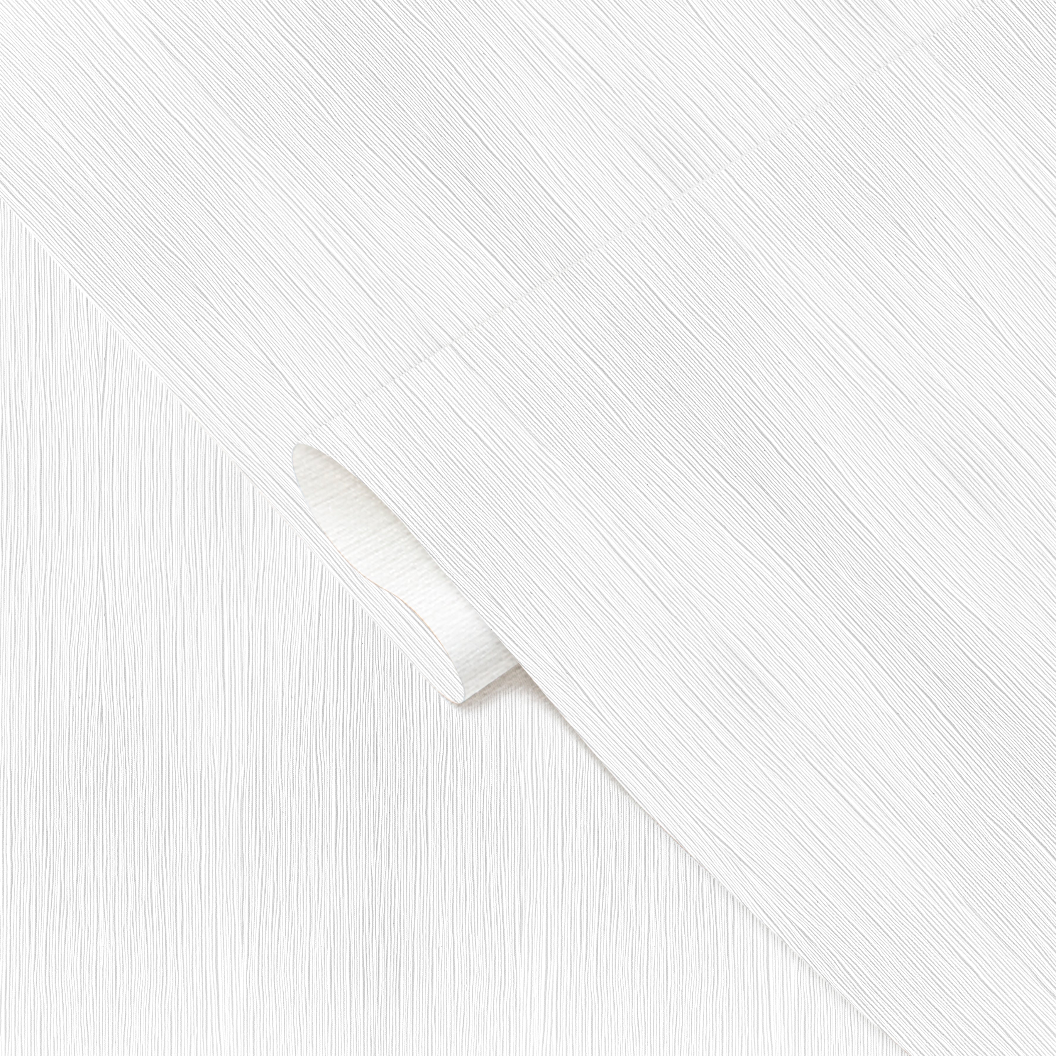 White paper with a diagonal cut on a white background