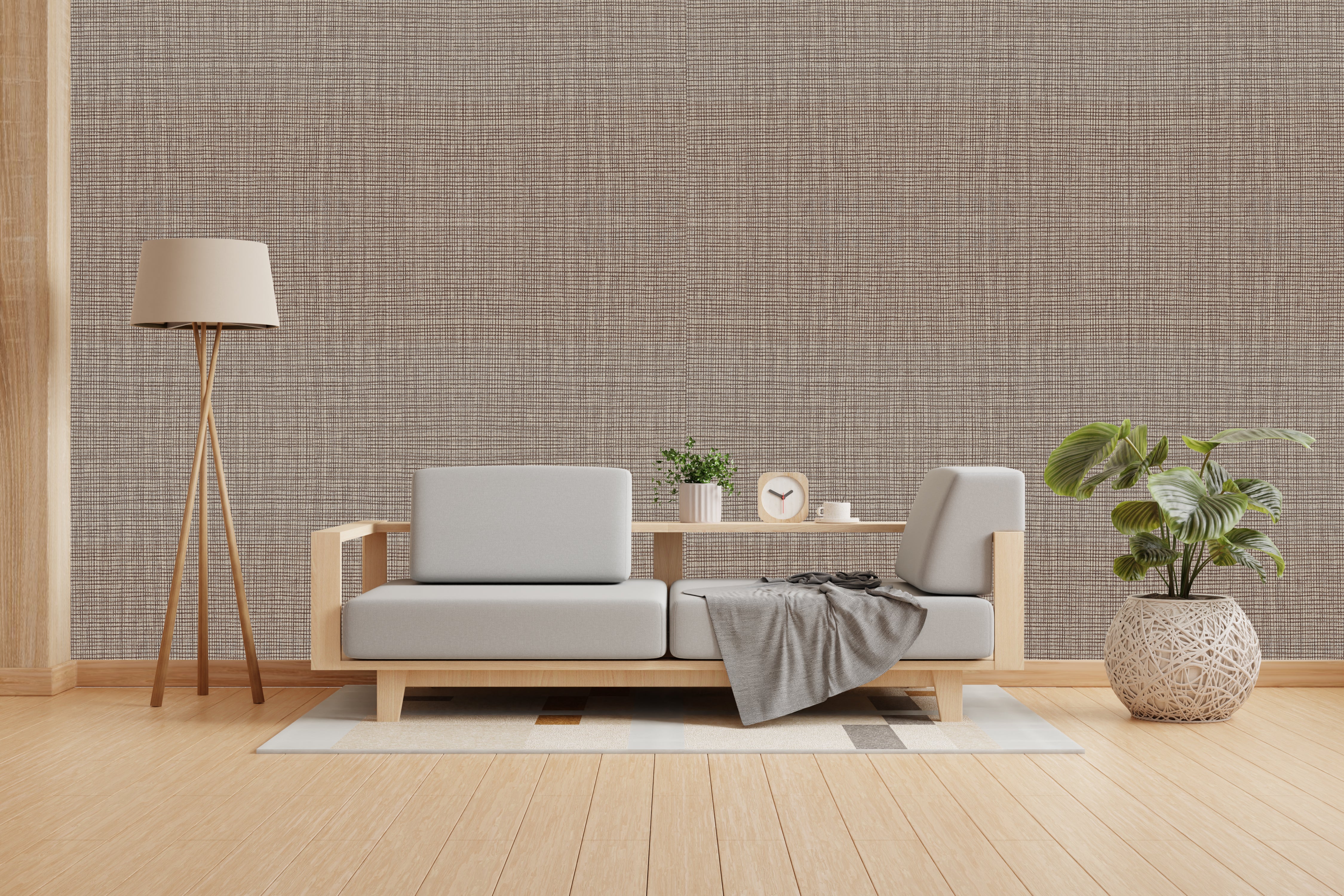 Vishal Wallpapers - The Best Wallpaper Company In India, Modern living room with a gray sofa, wooden coffee table, and decorative items against a textured wall.