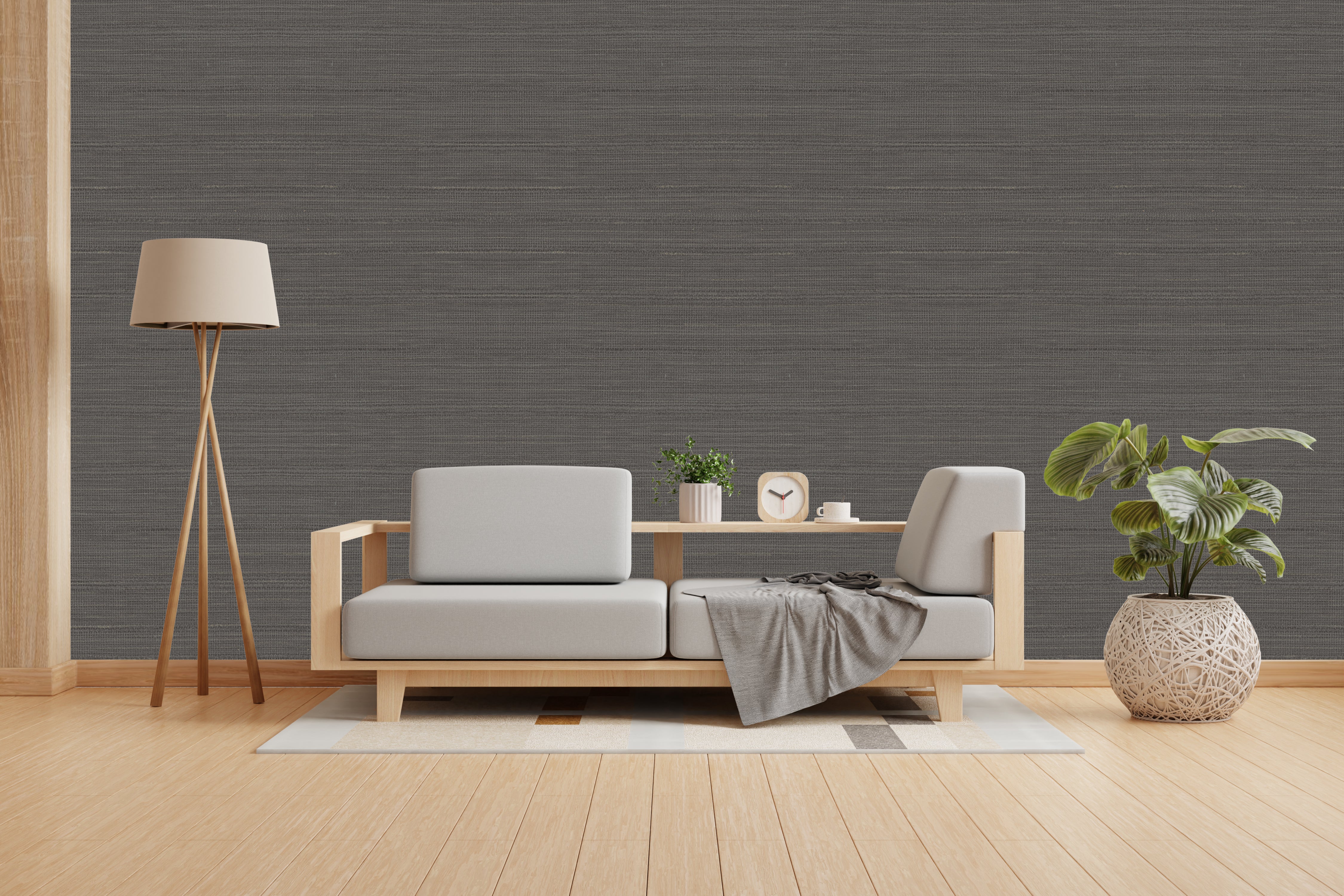Vishal Wallpapers - The Best Wallpaper Company In India, Modern living room with a gray sofa, wooden coffee table, and decorative items against a gray wall.