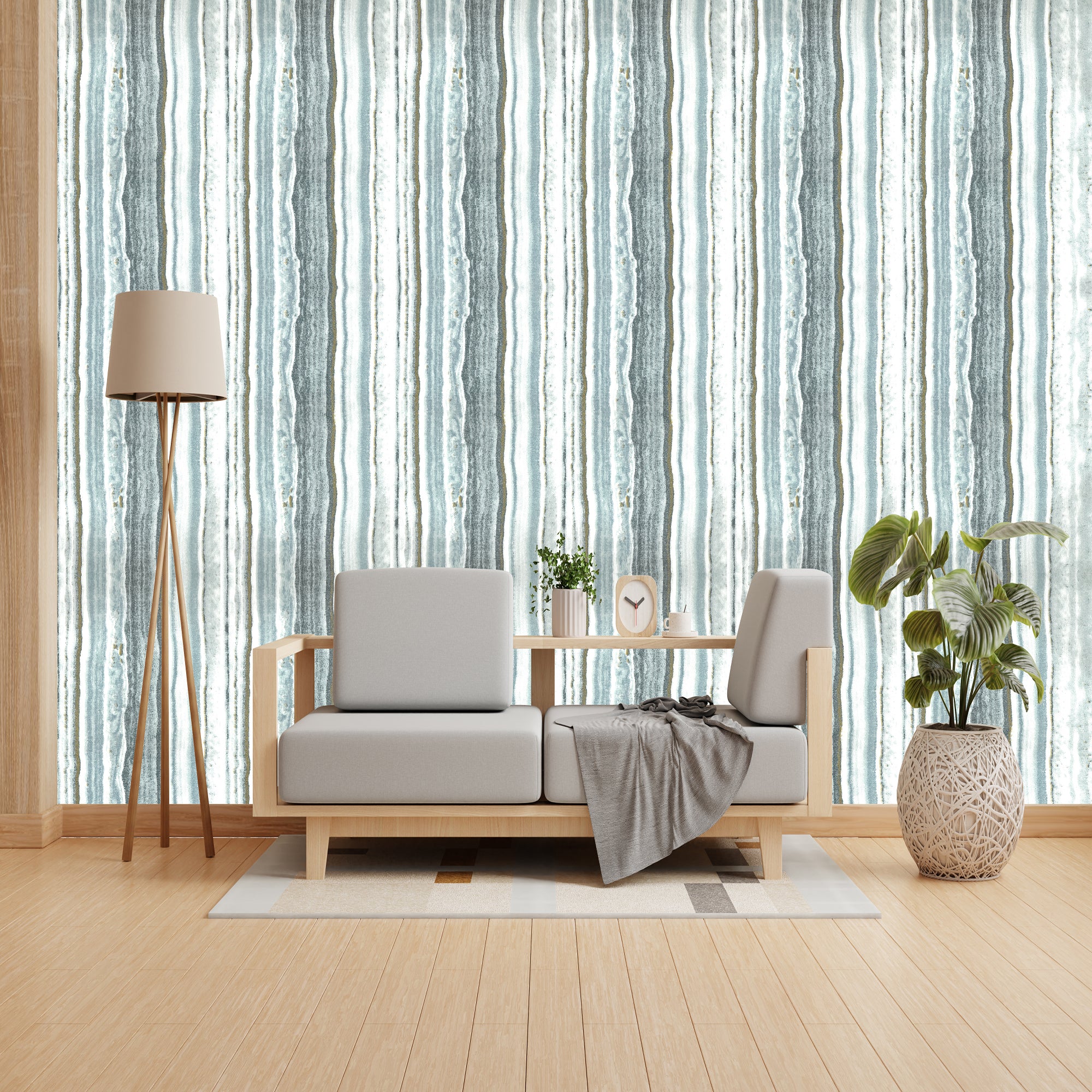 Modern living room with a sofa, lamp, and decorative items against a striped wallpaper.