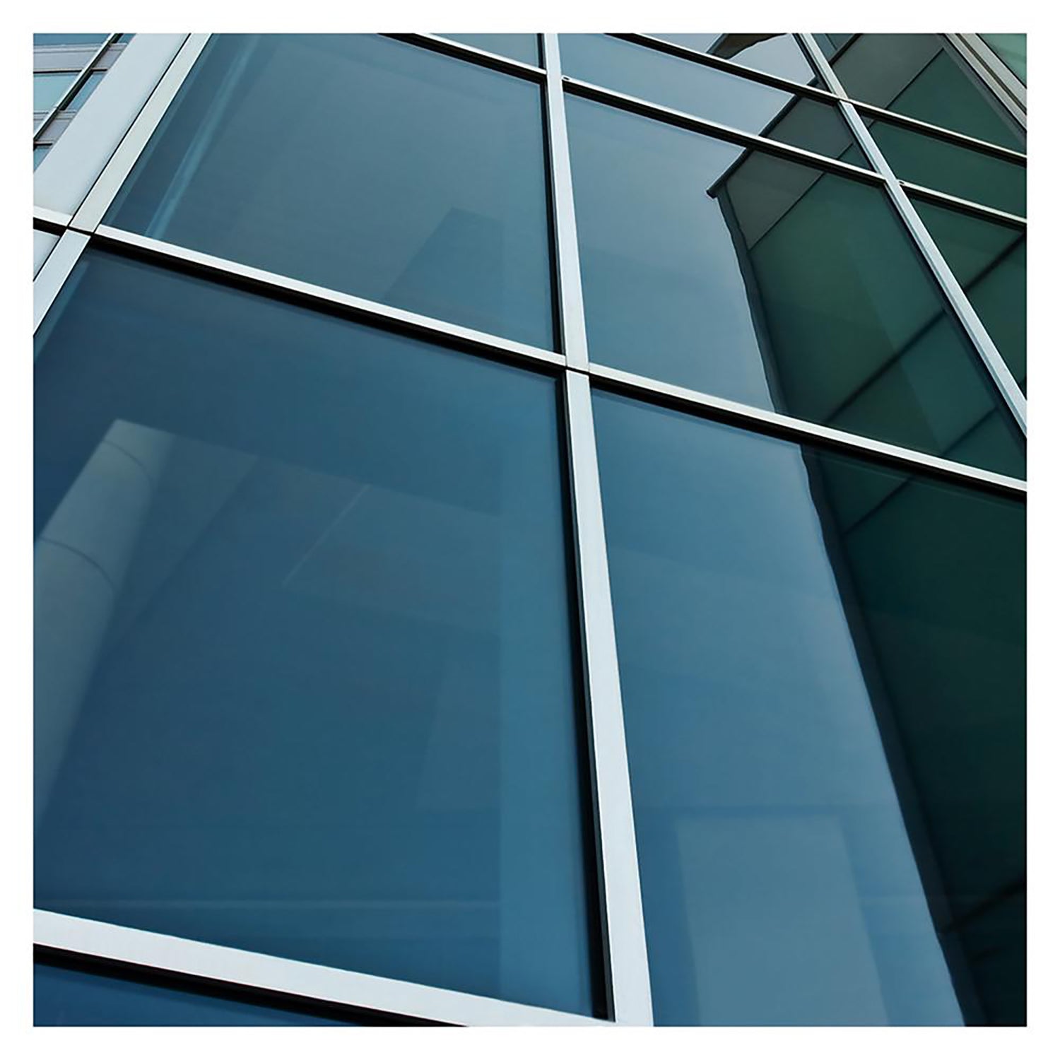 Commercial Building with Dark Blue Window Film - Sun Control & Privacy