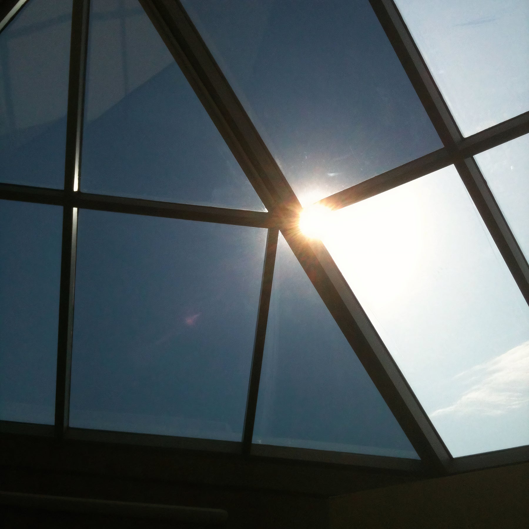 Pyramid Skylight with Sun Control Film - Bright Sunlight & Blue Sky